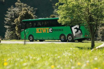 kiwi experience bus pass hop on hop off new zealand backpacker