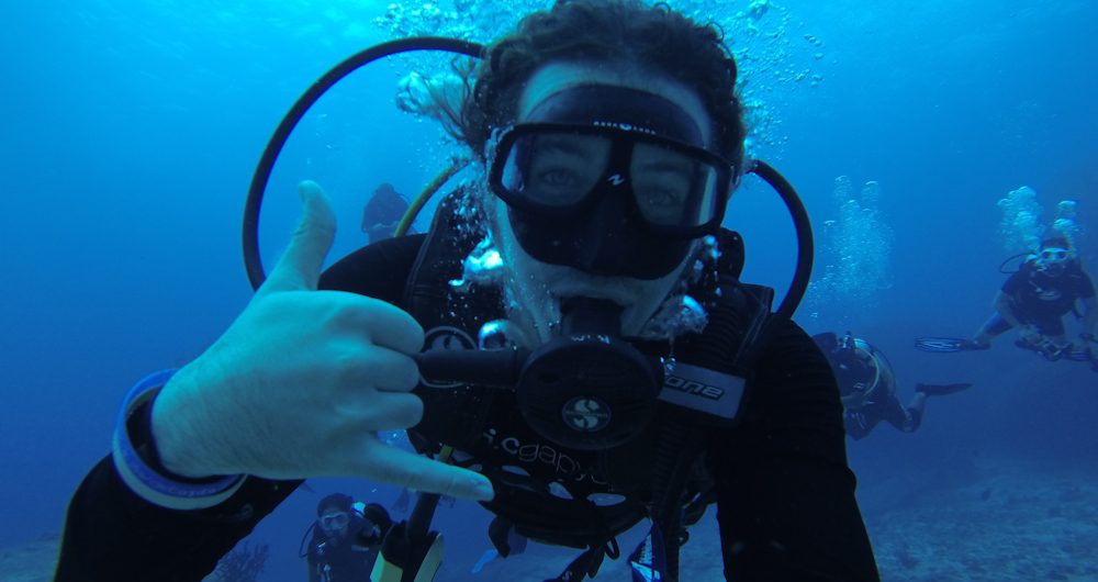 backpacker scuba diving